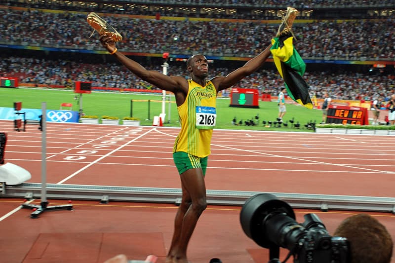 Usain Bolt celebrates his victory in the 100m at the 2008 Beijing Olympics